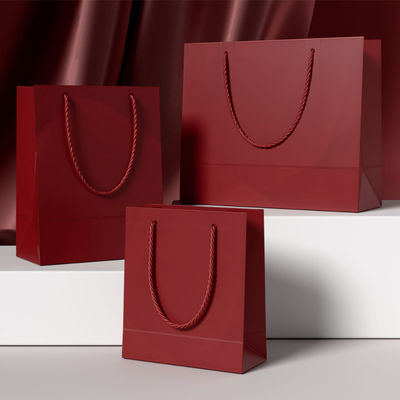 Custom Clothing Shopping Bags Packaging Luxury Ivory Board Kraft Paper Low Price  Shopping Gift Bag Custom Logo