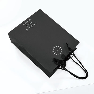 Custom Design Luxury Black Matte Thick Paper Clothing Packaging Gift Shopping Bag With Logo Ribbon And Handle