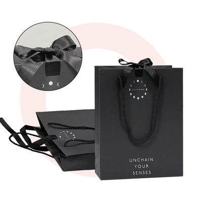 Custom Design Luxury Black Matte Thick Paper Clothing Packaging Gift Shopping Bag With Logo Ribbon And Handle