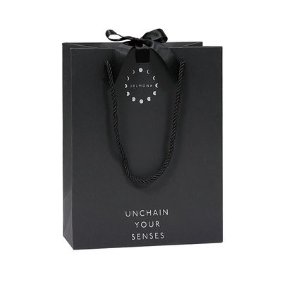 Custom Design Luxury Black Matte Thick Paper Clothing Packaging Gift Shopping Bag With Logo Ribbon And Handle