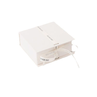 White Ribbon Logo Foldable Gift Box Make Up Clothes Accessories Rigid Paperboard With Glossy Lamination