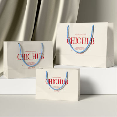 Custom Clothing Shopping Bags Packaging Luxury Ivory Board Kraft Paper Low Price  Shopping Gift Bag Custom Logo