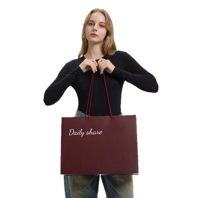 Custom Elegant large paper shopping bags for Dresses Personalized Logo Design Recycled Fashion Bulk Luxury Branded Carry Bags for Stores