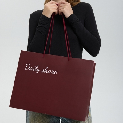 Custom Elegant large paper shopping bags for Dresses Personalized Logo Design Recycled Fashion Bulk Luxury Branded Carry Bags for Stores