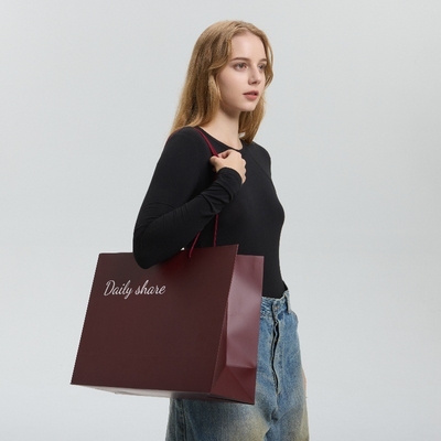 Custom Elegant large paper shopping bags for Dresses Personalized Logo Design Recycled Fashion Bulk Luxury Branded Carry Bags for Stores